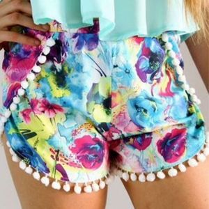 Rainbow floral shorts with pom pom